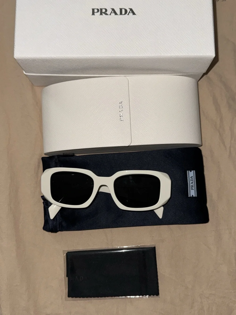 Prada Ivory Rectangular Sunglasses with Dark Lenses